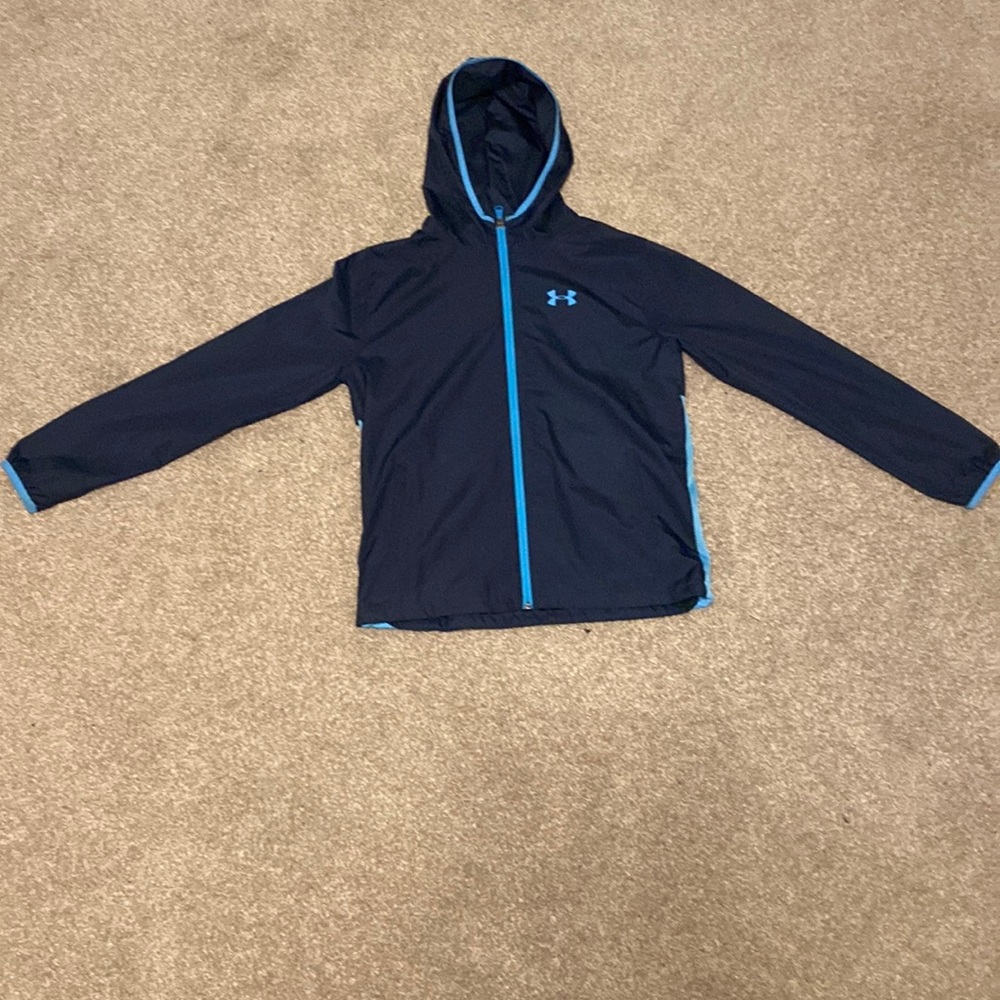 Large blue windbreaker, see through adidas hoody.